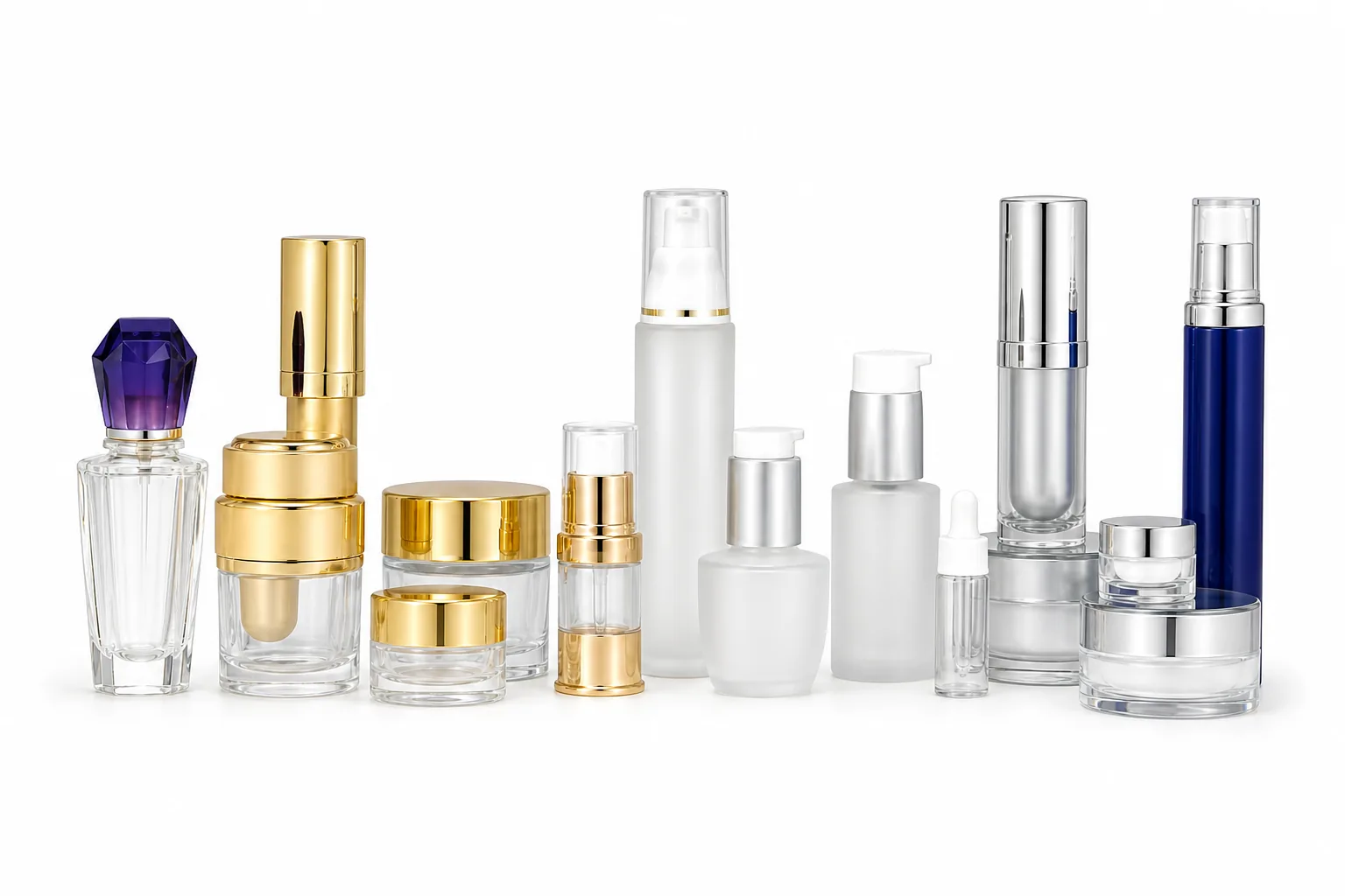Deluxe private label packaging: faceted glass bottle, gold and silver airless pumps, gold-lidded acrylic jars and frosted glass pump bottles.